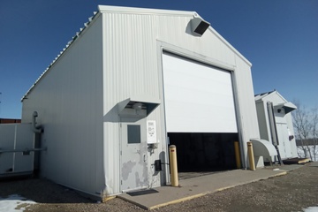 Decanter and solid separation building