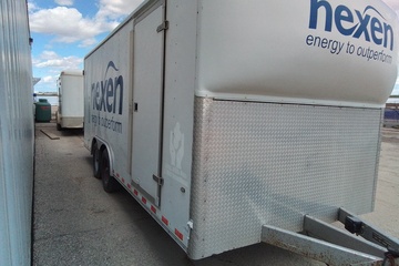 2002 Wells Cargo tandem-axle enclosed cargo trailer c/w SS Interior benches